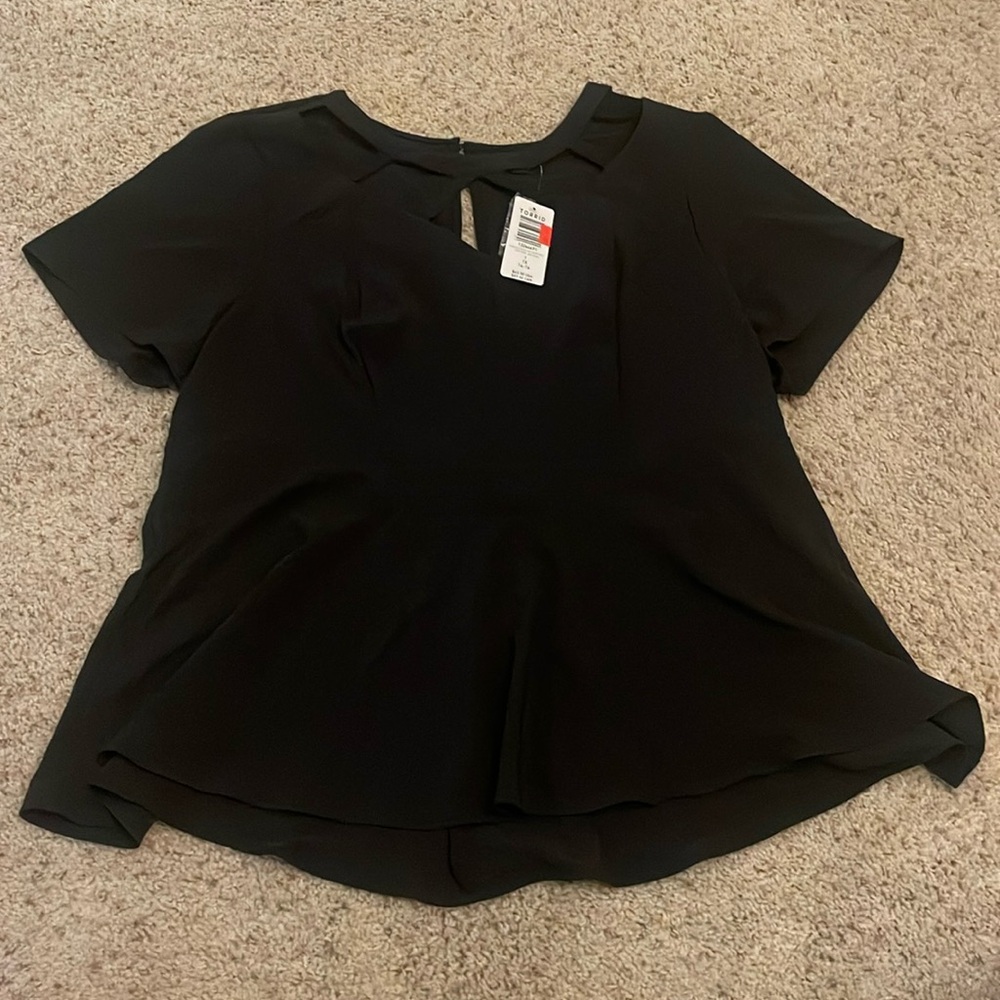 Torrid women’s peplum blouse size one